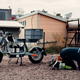 A grey Ösa :work bike parked on a building site